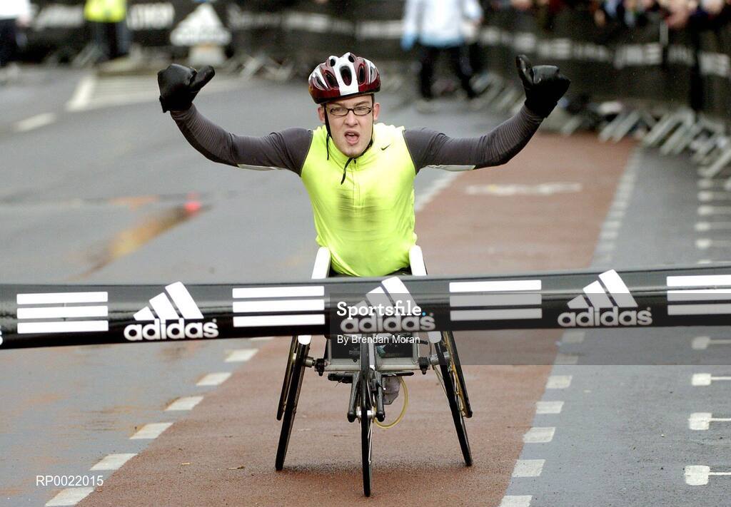 31 October 2005; John Glynn celebrates as he comes home to win the Men's Wheelchair section during the 2005 adidas Dublin City Marathon. Picture credit: Brendan Moran / SPORTSFILE