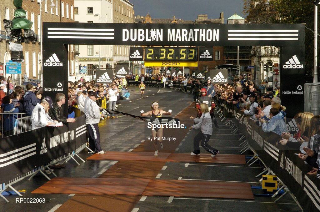 31 October 2005; Zinaida Samenova of Russia crosses the line to win the Women's race at the 2005 adidas Dublin City Marathon. Picture credit: Pat Murphy / SPORTSFILE