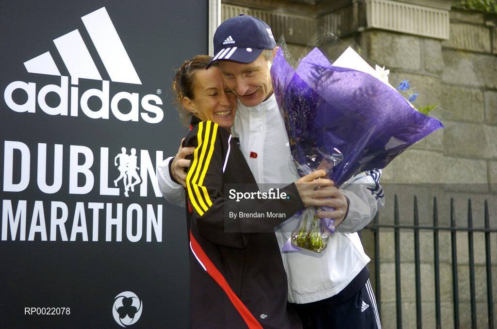 31 October 2005; First Irish woman home Pauline Curley is congratulated by Race Director Jim Aughney after the 2005 adidas Dublin City Marathon. Picture credit: Brendan Moran / SPORTSFILE