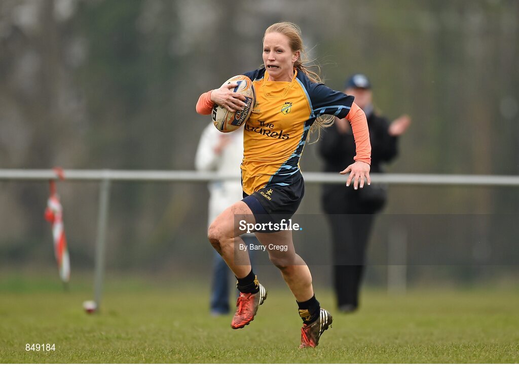 29 March 2014; Sara Phelan, Clondalkin, breaks away with the ball on her way to score her sides fourth try of the game. The Paul Flood Cup Final, Clondalkin v Gorey, NUIM Barhnall RFC, Leixlip, Co. Kildare. Picture credit: Barry Cregg / SPORTSFILE