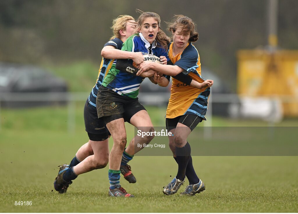 29 March 2014; Lauren Farrell, Gorey is tackled by Mairead Holohan, left, and Claire WInters, Clondalkin. The Paul Flood Cup Final, Clondalkin v Gorey, NUIM Barhnall RFC, Leixlip, Co. Kildare. Picture credit: Barry Cregg / SPORTSFILE
