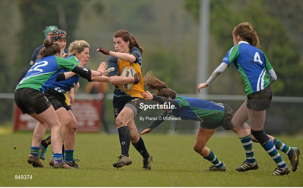 29 March 2014; Gael Stowe, Clondalkin, is tackled by Gorey players from left, Schalan Cullen, Ann Flynn McGivern, Fiona Murphy and Dawn Tully. The Paul Flood Cup Final, Clondalkin v Gorey, NUIM Barhnall RFC, Leixlip, Co. Kildare. Picture credit: Piaras Ó Mídheach / SPORTSFILE