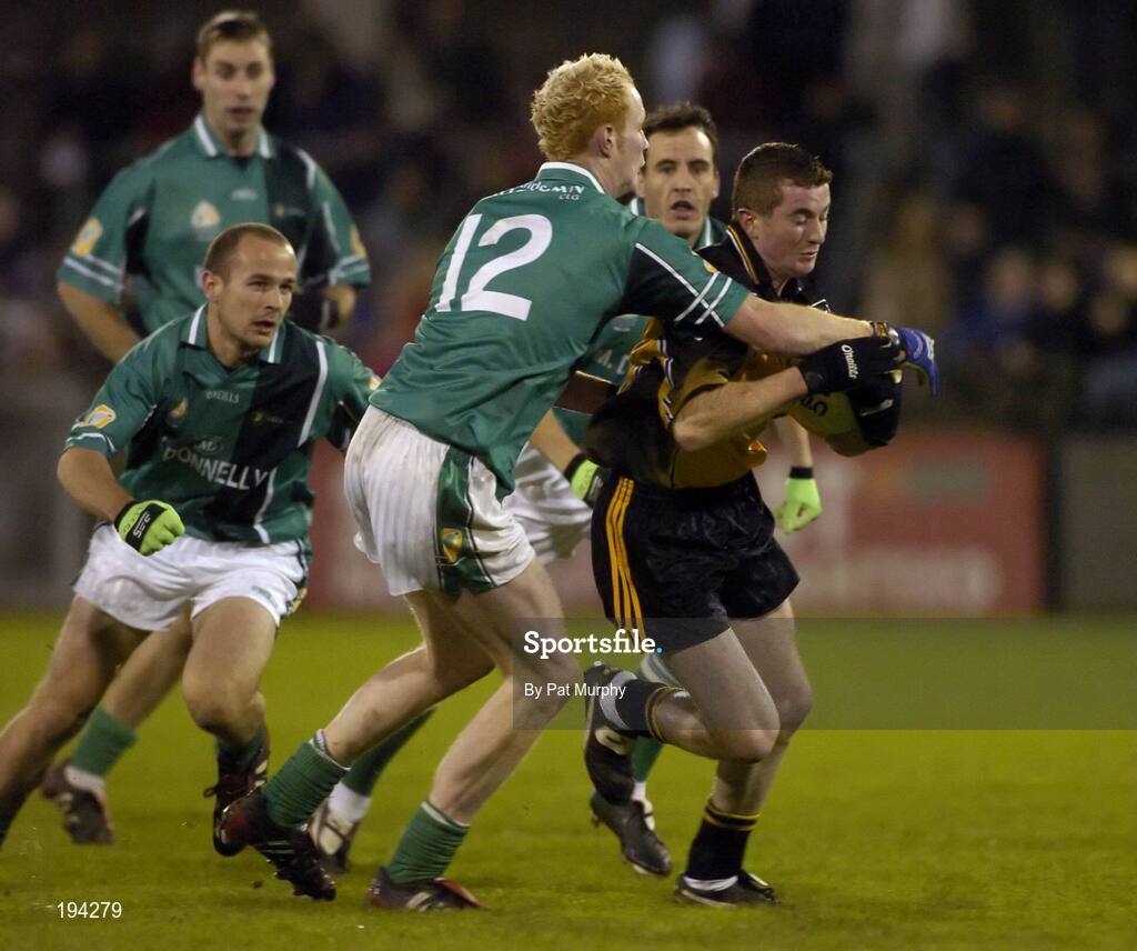 12 November 2005; Thomas Freeman, Ulster, in action against Padraig Clancy, 12, Tom Kelly, left, and Damien Healy, partially hidden, Leinster. M Donnelly Interprovincial Football Championship Final, Leinster v Ulster, Parnell Park, Dublin. Picture credit: Pat Murphy / SPORTSFILE