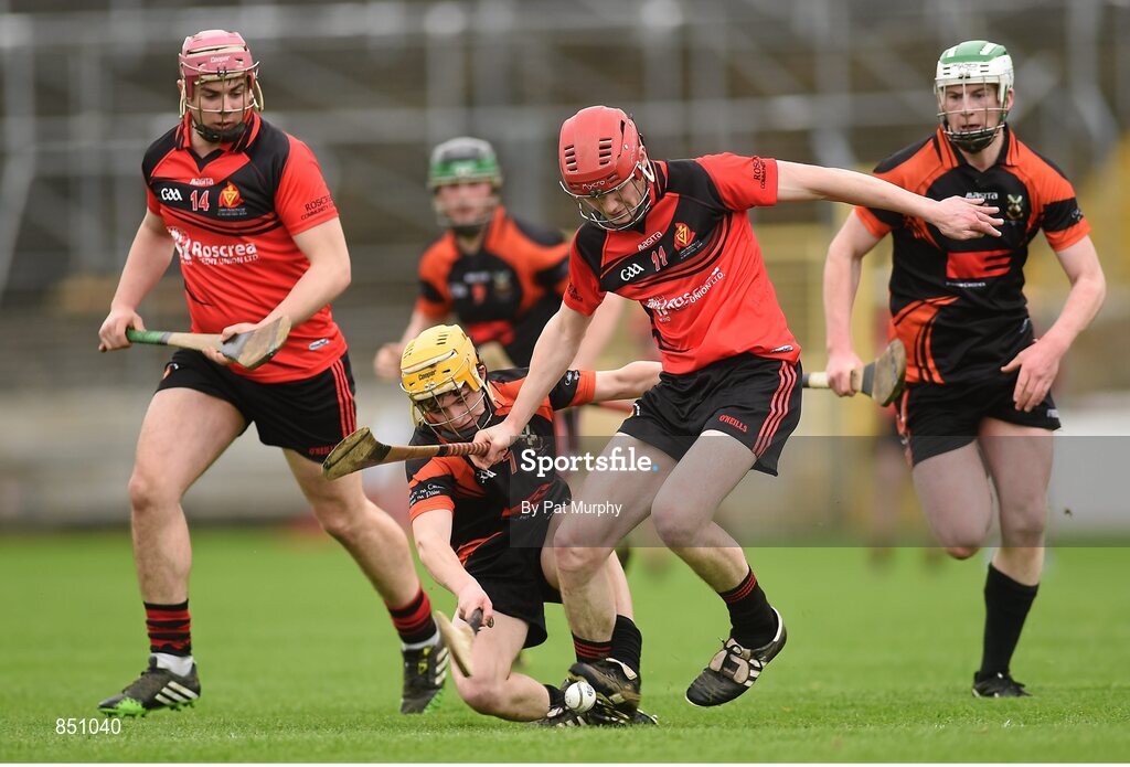 5 April 2014; Paddy Joe Graham, Cross & Passion, in action against Shane Sampson, left, and Sean Fogarty, Coláiste Phobal. Masita GAA All-Ireland Post Primary Schools Paddy Buggy Cup Final, Coláiste Phobal, Ros Cré, Co. Tipperary v Cross & Passion, Ballycastle, Co Antrim. Nowlan Park, Kilkenny. Picture credit: Pat Murphy / SPORTSFILE