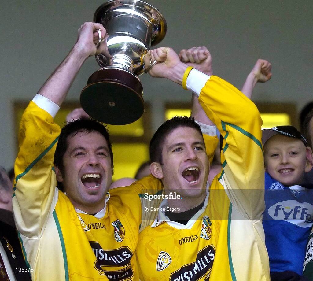 27 November 2005; St. Galls players Gary McGirr, left and Sean Kelly lift the Seamus McFerran Cup. Ulster Club Senior Football Championship Final, Bellaghy v St. Galls, Healy Park, Omagh, Co. Tyrone. Picture credit: Damien Eagers / SPORTSFILE