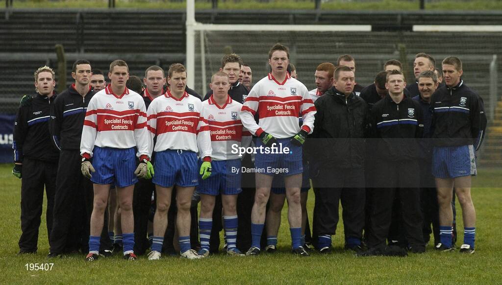 27 November 2005; The Bellaghy squad stand for the national anthem Amhran na bhFliann. Ulster Club Senior Football Championship Final, Bellaghy v St. Galls, Healy Park, Omagh, Co. Tyrone. Picture credit: Damien Eagers / SPORTSFILE