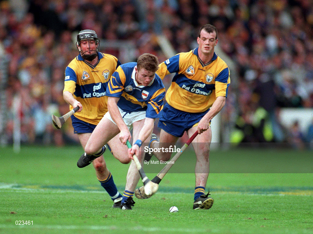 14 September 1997; Conor Gleeson of Tipperary in action against Conor Clancy, left, and Ollie Baker of Clare during the Guinness All-Ireland Senior Hurling Championship Final match between Clare and Tipperary at Croke Park in Dublin. Photo by Matt Browne/Sportsfile