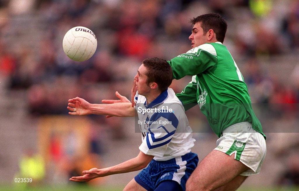 30 May 1999; Dermot McDermott of Monaghan in action against Seán Quinn of Fermanagh during the Bank of Ireland Ulster Senior Football Championship Preliminary Round match between Monaghan and Fermanagh at St Tiernach's Park in Clones, Monaghan. Photo by Damien Eagers/Sportsfile