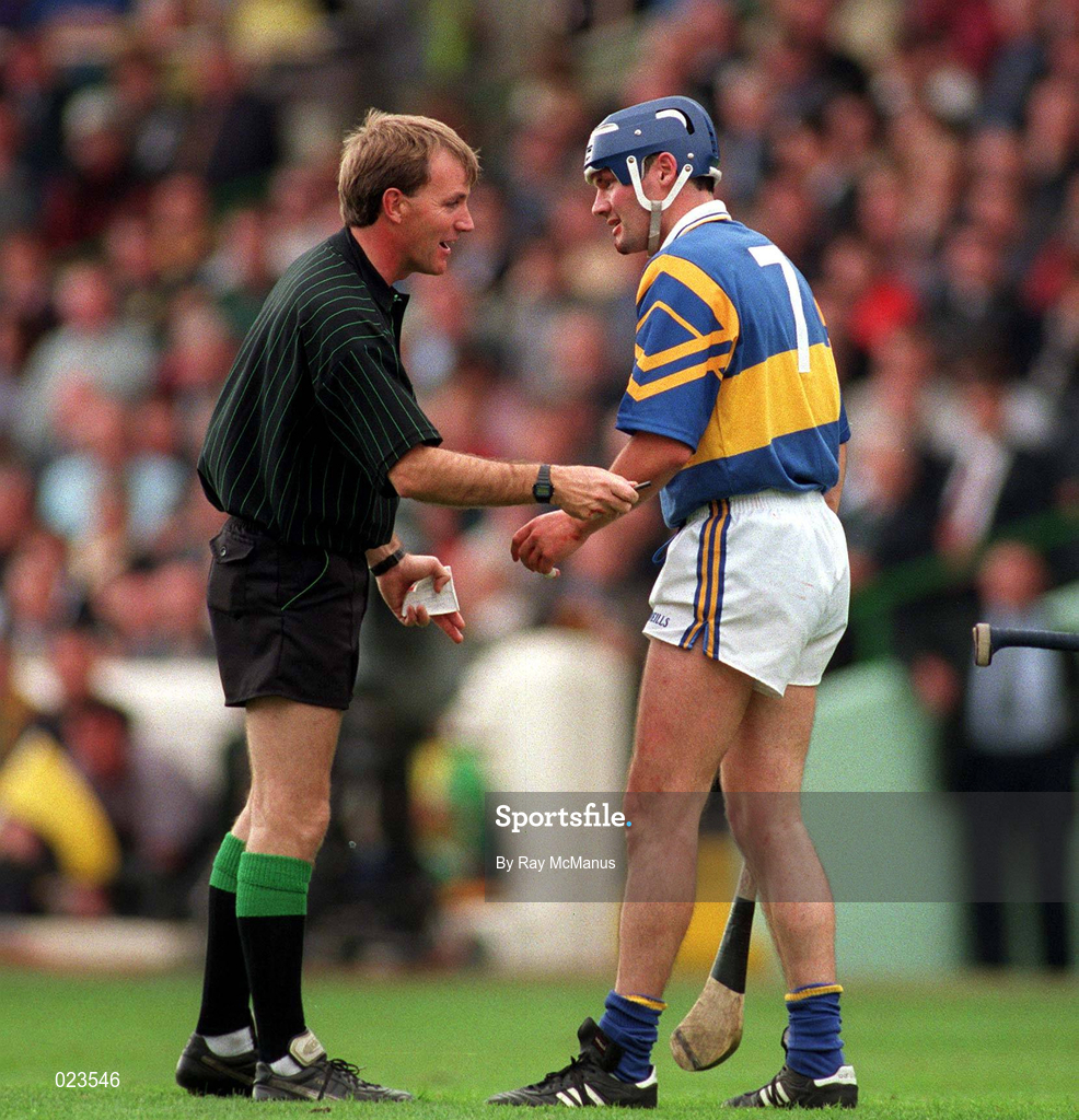 14 September 1997; Referee Dickie Murphy speaks to Conal Bonnar of Tipperary during the Guinness All-Ireland Senior Hurling Championship Final match between Clare and Tipperary at Croke Park in Dublin. Photo by Ray McManus/Sportsfile