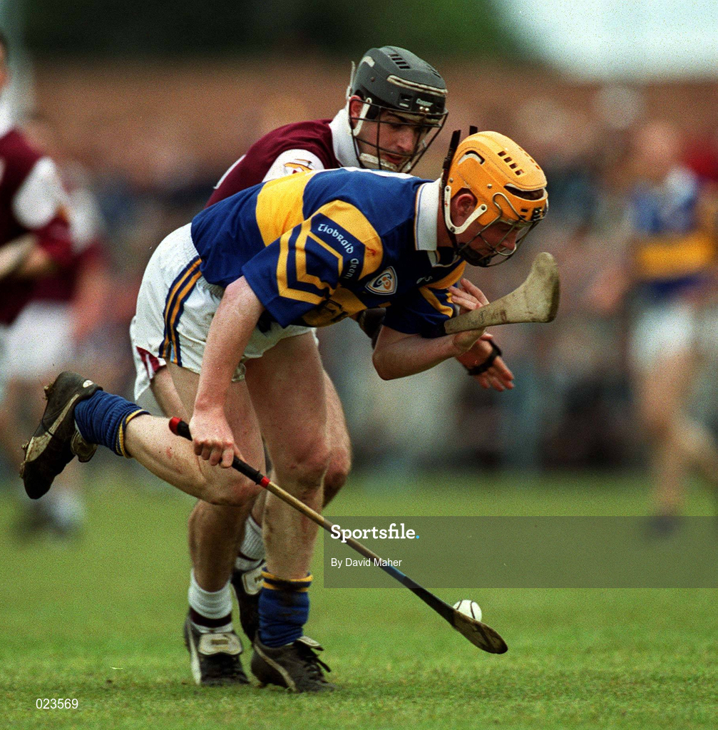 16 May 1999; Eamonn Corcoran of Tipperary in action against Cathal Moore of Galway during the Church & General National Hurling League Division 1 Final match between Galway and Tipperary at Cusack Park in Ennis, Clare. Photo by David Maher/Sportsfile