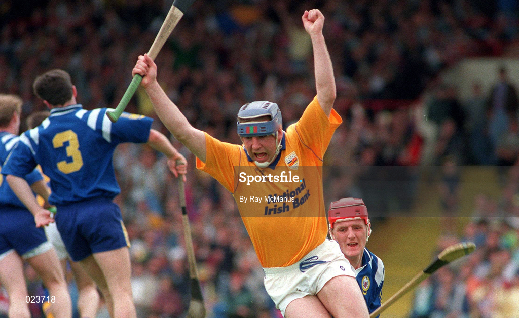 4 July 1993; John Leahy of Tipperary celebrates scoring his side's first goal as Brian Lohan of Clare looks on during the Munster Senior Hurling Championship Final match between Clare and Tipperary at the Gaelic Grounds in Limerick. Photo by Ray McManus/Sportsfile