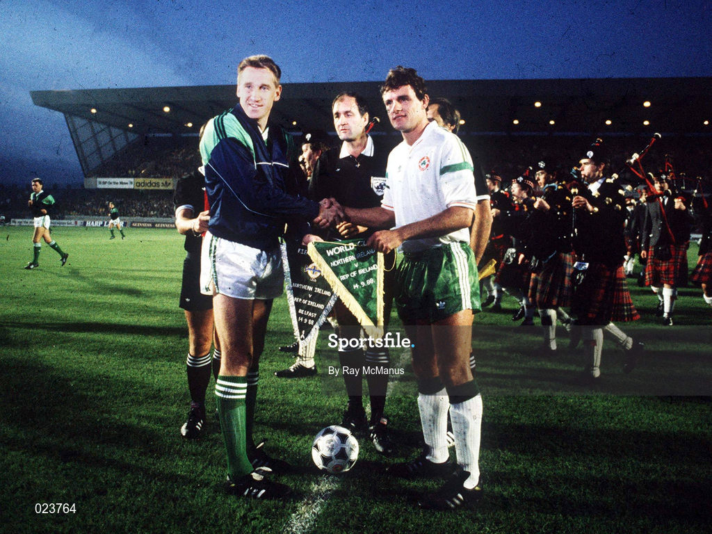 11 October 1989; Team captains John McClelland of Northern Ireland, left, and Kevin Moran of Republic of Ireland shake hands alongside referee Pietro D'Elia before the 1990 FIFA World Cup Qualifier match between Republic of Ireland and Northern Ireland at Lansdowne Road in Dublin. Photo by Ray McManus/Sportsfile