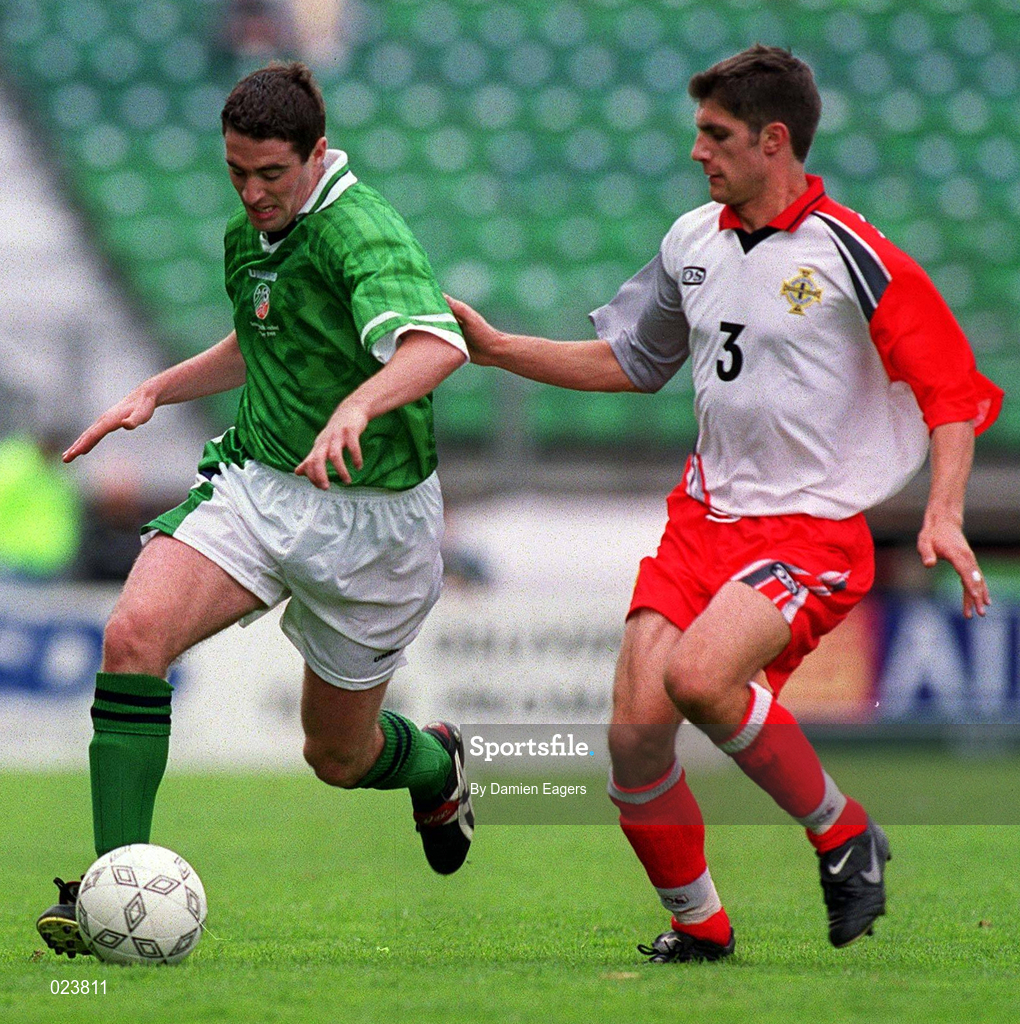29 May 1999; Mark Kennedy of Republic of Ireland in action against Aaron Hughes of Northern Irelandd during the International Friendly match between Republic of Ireland and Northern Ireland at Lansdowne Road in Dublin. Photo by Damien Eagers/Sportsfile