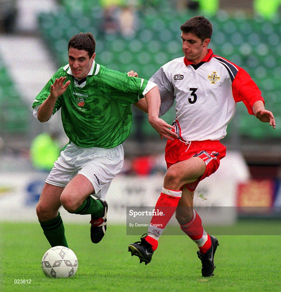 29 May 1999; Mark Kennedy of Republic of Ireland in action against Aaron Hughes of Northern Ireland during the International Friendly match between Republic of Ireland and Northern Ireland at Lansdowne Road in Dublin. Photo by Damien Eagers/Sportsfile