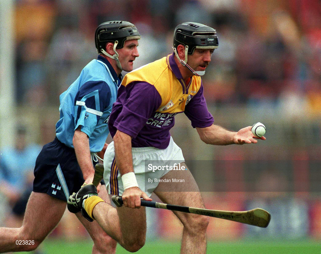 23 June 1996; Martin Storey of Wexford in action against Andy O'Callaghan of Dublin during the Guinness Leinster Senior Hurling Championship Semi-Final match between Dublin and Wexford at Croke Park in Dublin. Photo by Brendan Moran/Sportsfile