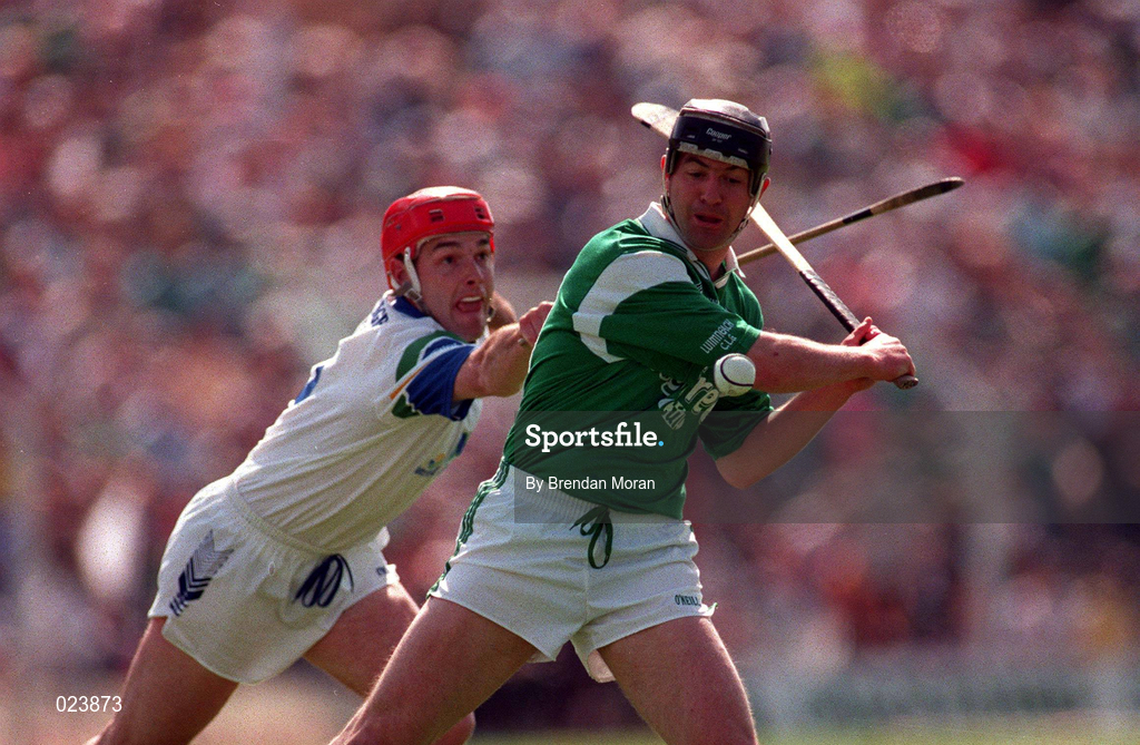 25 May 1997; Mike Galligan of Limerick is tackled by Stephen Frampton of Waterford during the Guinness Munster Senior Hurling Championship Quarter-Final match between Limerick and Waterford at Semple Stadium in Thurles, Tipperary. Photo by Brendan Moran/Sportsfile