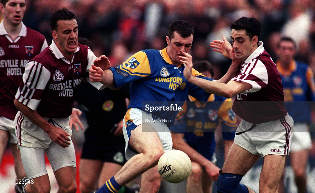30 May 1999; Paul Barden of Longford in action against Damien Healy and Kieran Ryan of Westmeath during the Bank of Ireland Leinster Senior Football Championship 2nd Preliminary Round match between Westmeath and Longford at Cusack Park in Mullingar, Westmeath. Photo by Aoife Rice/Sportsfile