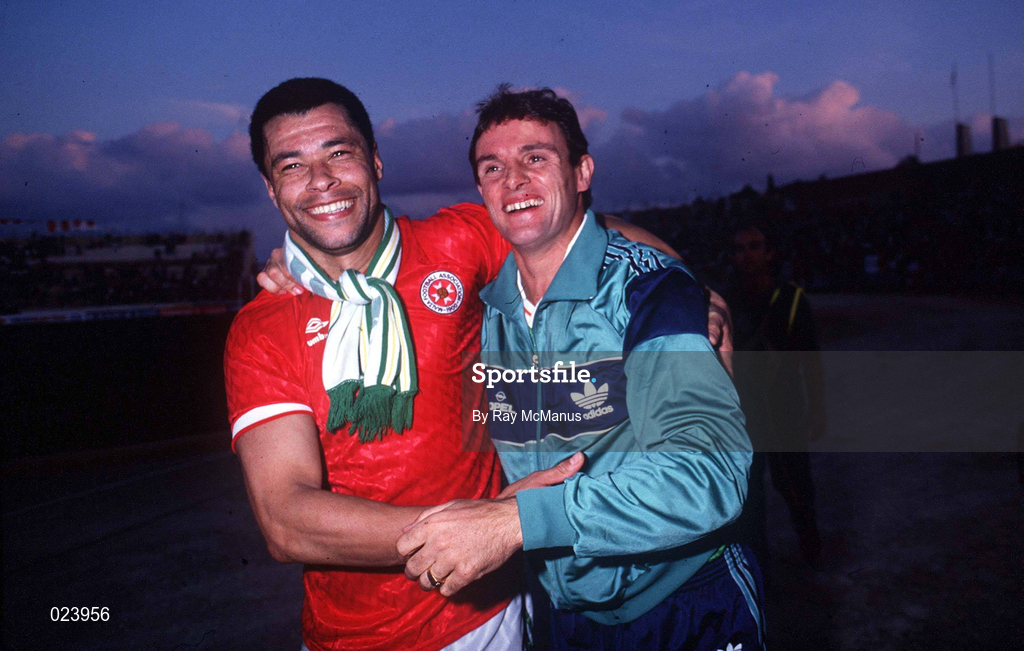 15 November 1989; Paul McGrath, left, and Kevin Moran of Republic of Ireland celebrate qualification for the World Cup after the FIFA World Cup Qualifying match between Matla and Republic of Ireland at the Ta'Qali Stadium in Valetta, Malta. Photo by Ray McManus/Sportsfile