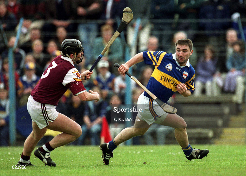 16 May 1999; Paul Shelley of Tipperary in action against Brian Feeney of Galway during the Church & General National Hurling League Division 1 Final match between Galway and Tipperary at Cusack Park in Ennis, Clare. Photo by Ray McManus/Sportsfile