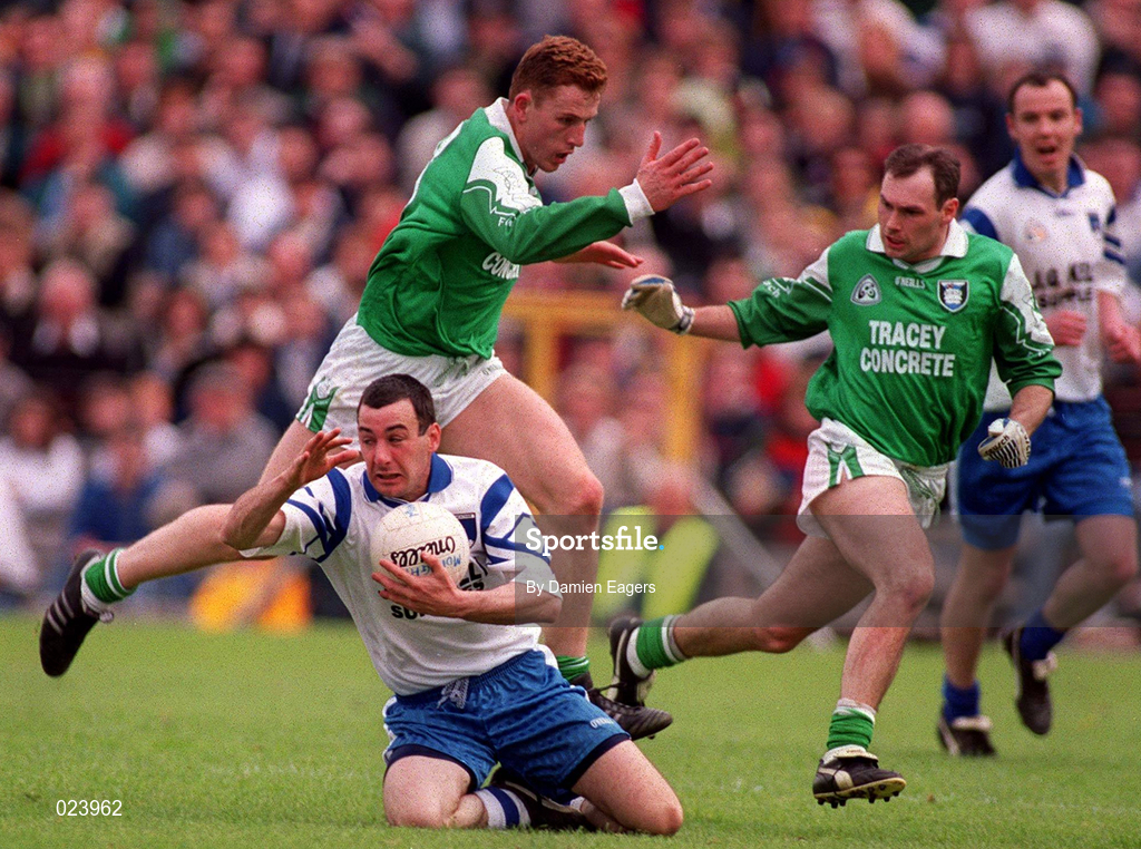 30 May 1999; Peter Duffy of Monaghan in action against Paul Brewster of Fermanagh during the Bank of Ireland Ulster Senior Football Championship Preliminary Round match between Monaghan and Fermanagh at St Tiernach's Park in Clones, Monaghan. Photo by Damien Eagers/Sportsfile