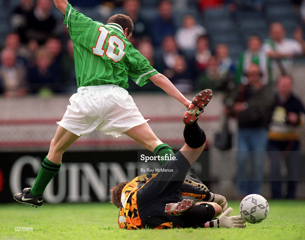 29 May 1999; Northern Ireland goalkeeper Roy Carroll saves at the feet of Robbie Keane of Republic of Ireland during the International Friendly match between Republic of Ireland and Northern Ireland at Lansdowne Road in Dublin. Photo by Ray McManus/Sportsfile