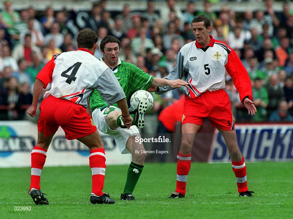 29 May 1999; Robbie Keane of Republic of Ireland in action against Mark Williams, 4, and Barry Hunter of Northern Ireland during the International Friendly match between Republic of Ireland and Northern Ireland at Lansdowne Road in Dublin. Photo by Damien Eagers/Sportsfile