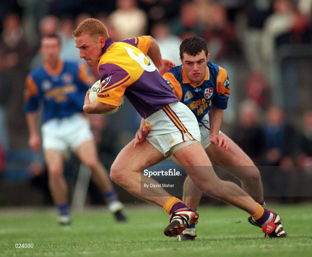 16 May 1999; Rory Stafford of Wexford in action against Paul Barden of Longford during the Bank of Ireland Leinster Senior Football Championship Preliminary Round Replay match between Longford and Wexford at Pearse Park in Longford. Photo by David Maher/Sportsfile