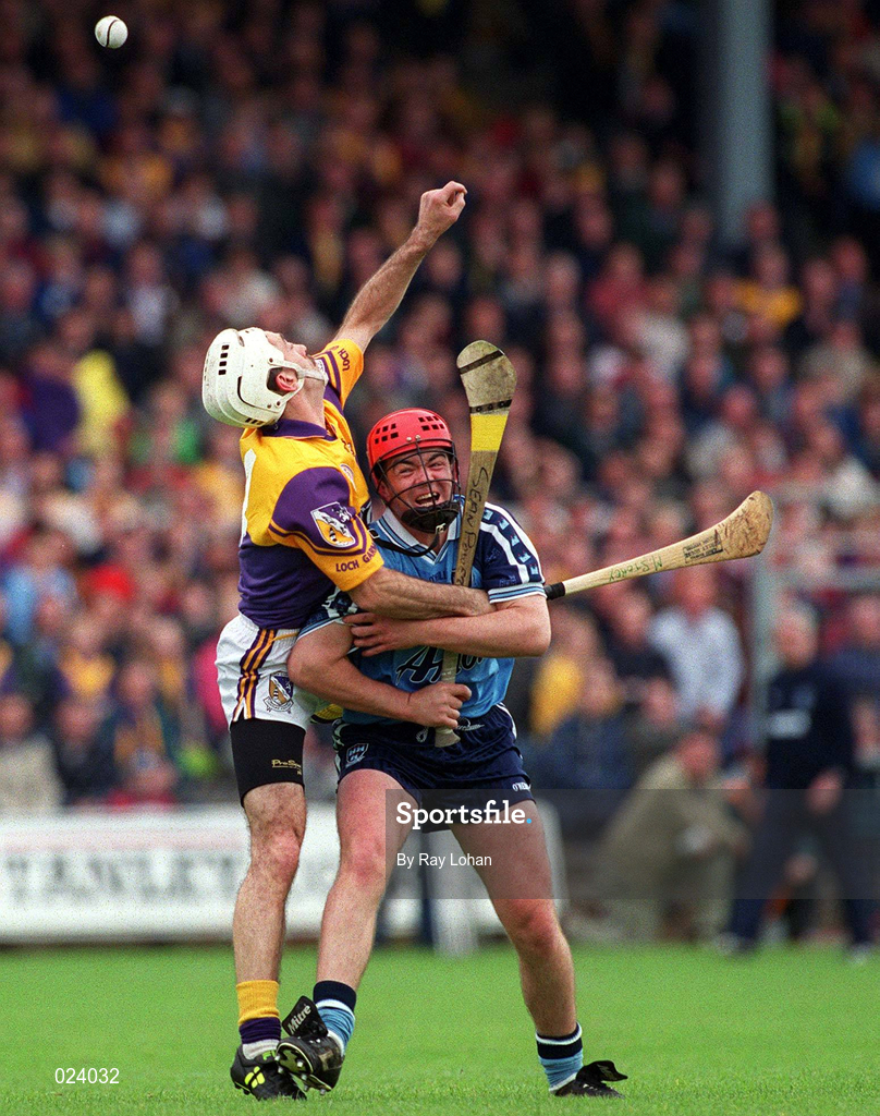30 May 1999; Martin Storey of Wexford in action against Seán Power of Dublin during the Guinness Leinster Senior Hurling Championship Quarter-Final match between Dublin and Wexford at Nowlan Park in Kilkenny. Photo by Ray Lohan/Sportsfile