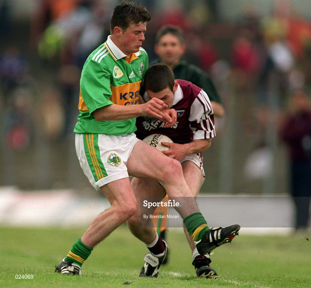 15 May 1999; Michael Ennis of Westmeath in action against Stephen O'Sullivan during the All-Ireland U21 Football Championship Final match at the Gaelic Grounds in Limerick. Photo by Brendan Moran/Sportsfile