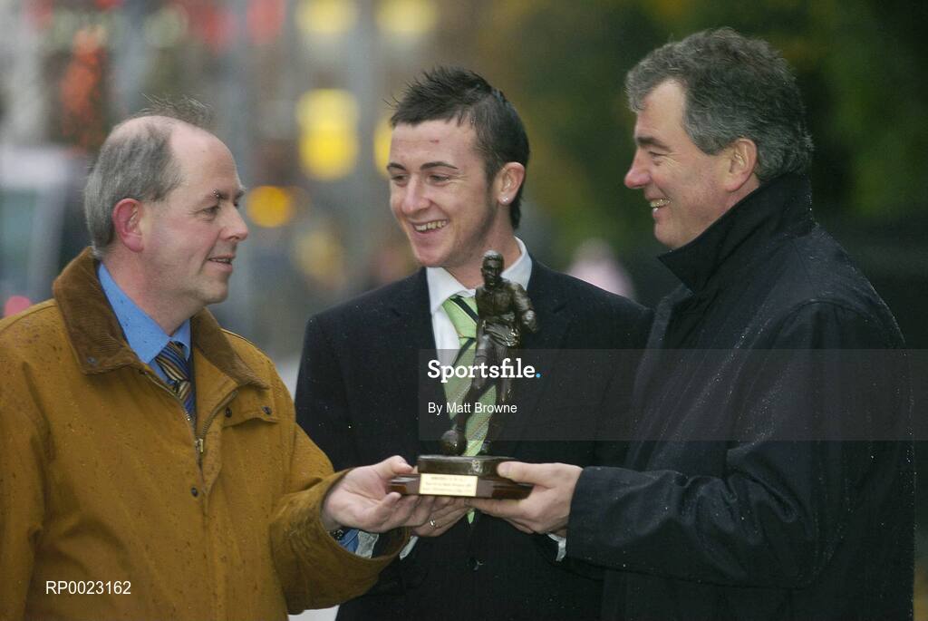 7 December 2005; Roy O'Donovan Cork City, who was presented with the eircom / Soccer Writers Association of Ireland Player of the Month award for November by Padraig Corkery, left, Head of Sponsorship with eircom and Cork City Manager Damien Richardson. Baggot Street, Dublin. Picture credit: Matt Browne / SPORTSFILE