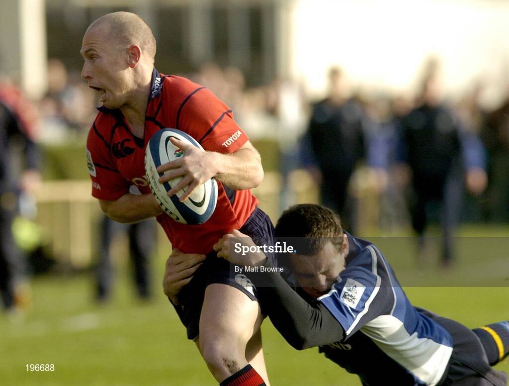 31 December 2005; Peter Stringer, Munster, is tackled by Kieran Lewis, Leinster. Celtic League 2005-2006, Group A, Leinster v Munster, RDS, Dublin. Picture credit: Matt Browne / SPORTSFILE