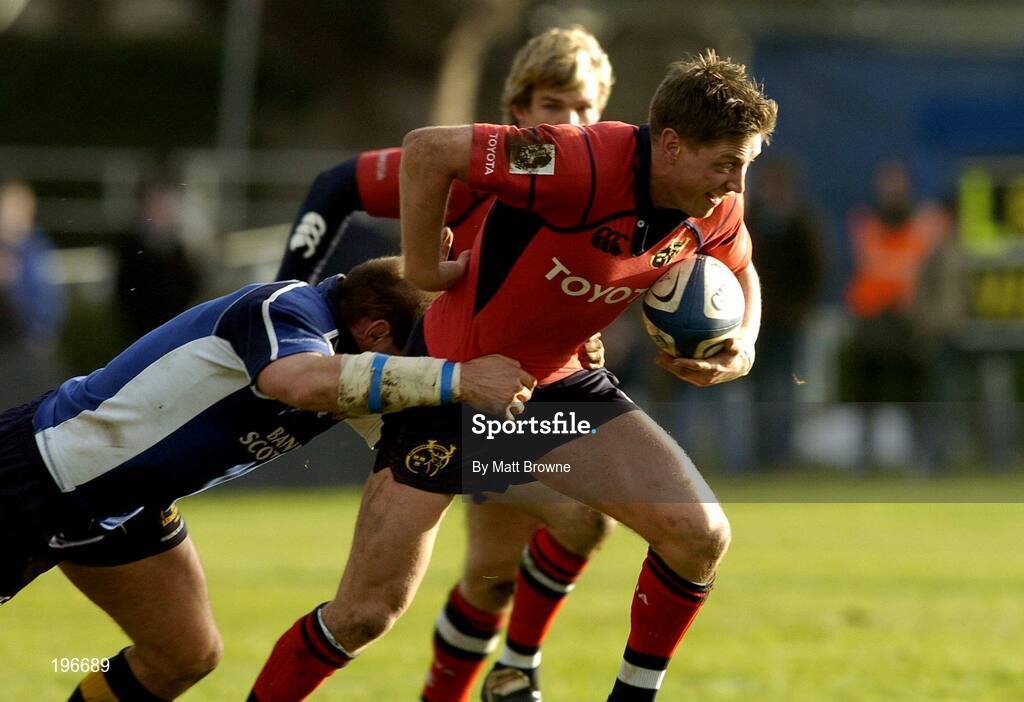 31 December 2005; Ronan O'Gara, Munster, is tackled by Keith Gleeson, Leinster. Celtic League 2005-2006, Group A, Leinster v Munster, RDS, Dublin. Picture credit: Matt Browne / SPORTSFILE