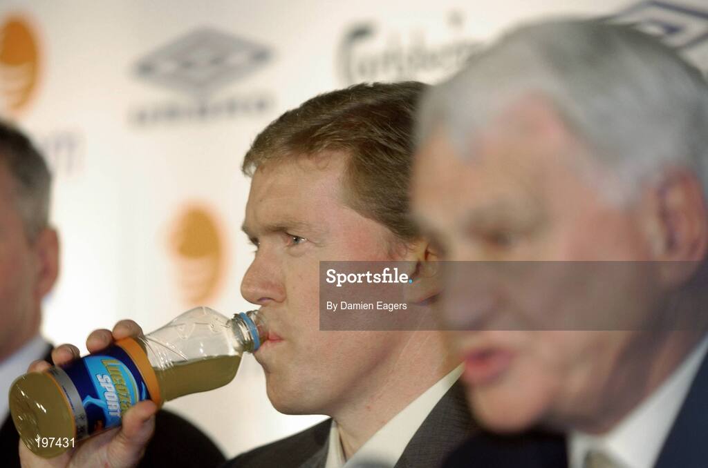 16 January 2006; Steve Staunton has a drink as he listens to Sir Bobby Robson, International football consultant during a FAI press conference to confirm his appointment as the new Manager of the Republic of Ireland Senior International Soccer Team. Mansion House, Dublin. Picture credit: Damien Eagers / SPORTSFILE