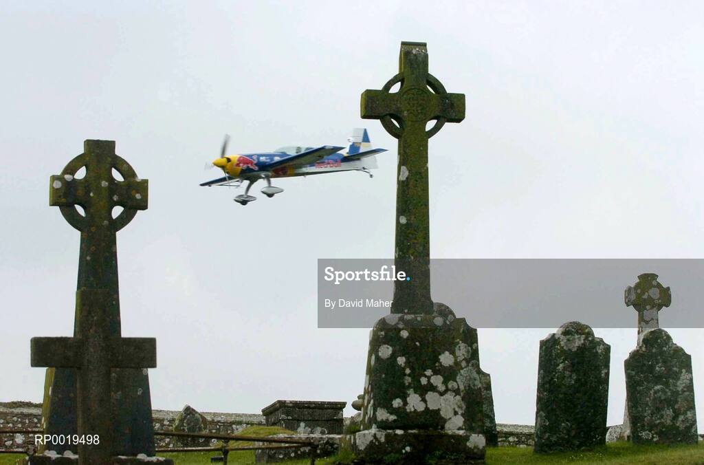 24 July 2005; Pilot Peter Besenyei, Hungary, in his Extra 330S aircraft, flies close to the Rock of Cashel grounds during the Red Bull Air Race. Cashel, Co. Tipperary. Picture credit; David Maher / SPORTSFILE