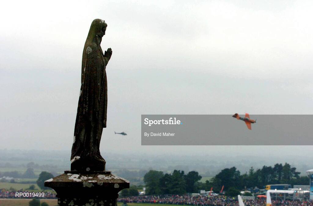 24 July 2005; Pilot, Nicolas Ivanoffi, France, in his Extra 230 aircraft, flies around the Rock of Cashel during the Red Bull Air Race. Cashel, Co. Tipperary. Picture credit; David Maher / SPORTSFILE