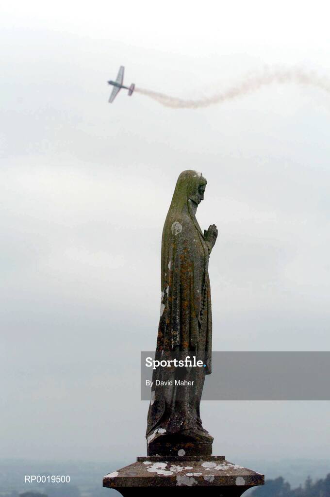 24 July 2005; Pilot, Nicolas Ivanoffi, France, in his Extra 230 aircraft, flies around the Rock of Cashel during the Red Bull Air Race. Cashel, Co. Tipperary. Picture credit; David Maher / SPORTSFILE