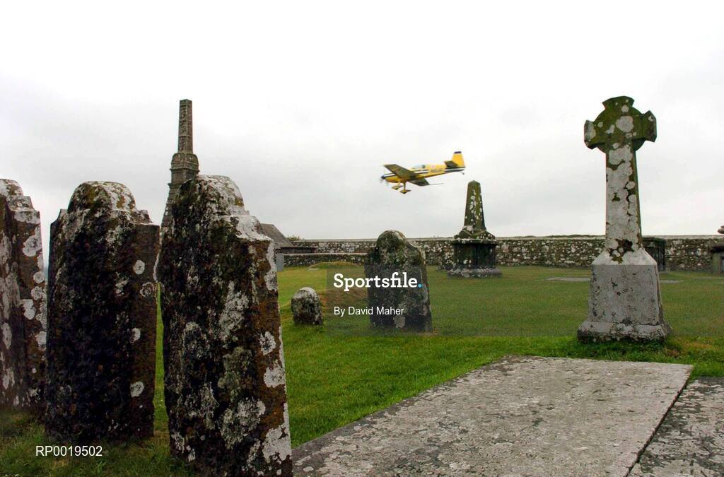 24 July 2005; Steve Jones, Great Britain, in his Extra 330S aircraft, flies close to the grounds of the Rock of Cashel during the Red Bull Air Race. Cashel, Co. Tipperary. Picture credit; David Maher / SPORTSFILE