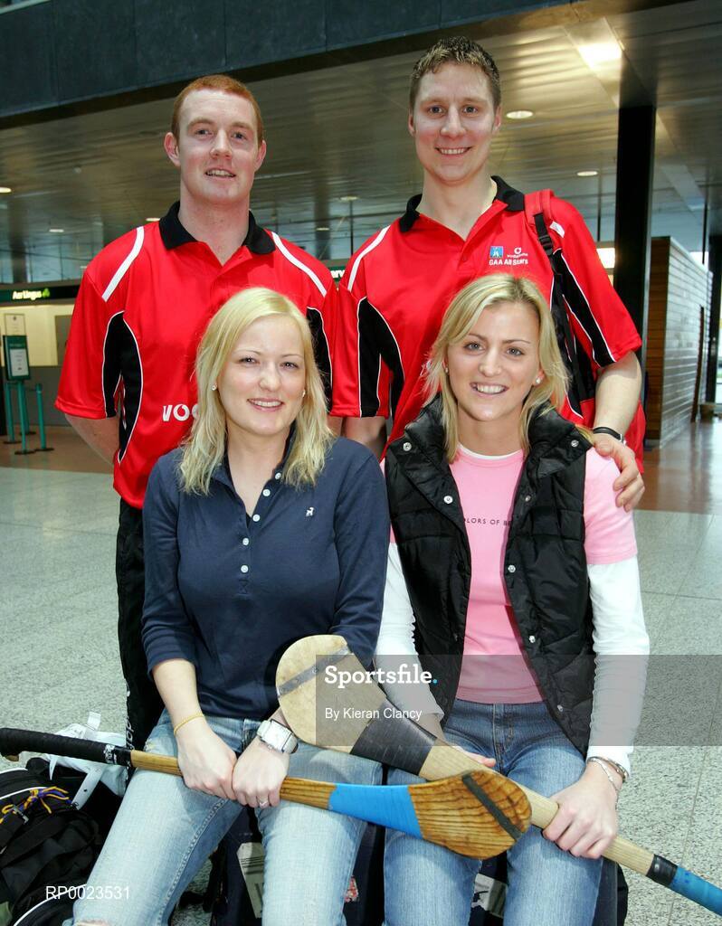 18 January 2006; Tipperary hurlers Eamonn Corcoran with his girlfriend Deirdre Delaney, Borrisoleigh, Co Tipperary, left and Philip Maher with his girlfriend Marie  Costello, Drom-Inch, Co. Tipperary, prior to their departure to Singapore for the 2006 Vodafone All-Stars Hurling Tour. Shannon Airport, Shannon, Co. Clare. Picture credit; Kieran Clancy / SPORTSFILE