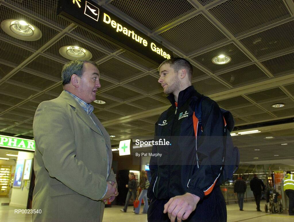 18 January 2006; GAA President Elect Nickey Brennan in conversation with Kilkenny's JJ Delaney prior to their departure to Singapore for the 2006 Vodafone All-Stars Hurling Tour. Dublin Airport, Dublin. Picture credit; Pat Murphy / SPORTSFILE