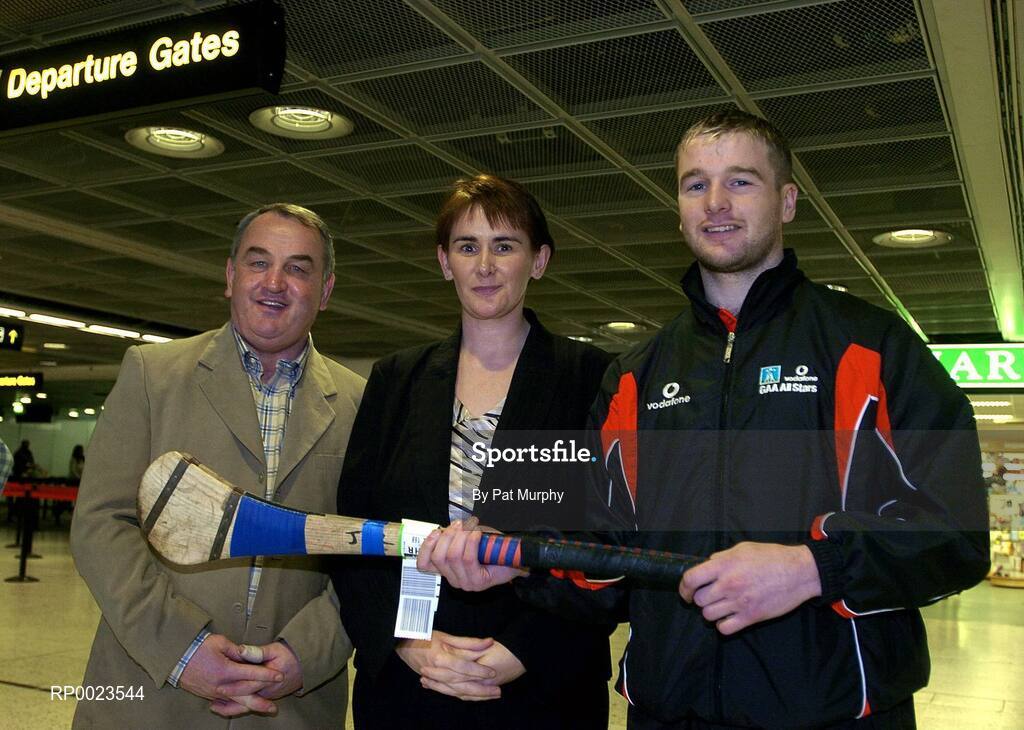 18 January 2006; Carolan Lennon, Marketing Director Vodafone Ireland, with GAA President elect Nicky Brennan, left, and Kilkenny hurler JJ Delaney prior to departure to Singapore for the 2006 Vodafone All-Stars Hurling Tour. Dublin Airport, Dublin. Picture credit; Pat Murphy / SPORTSFILE