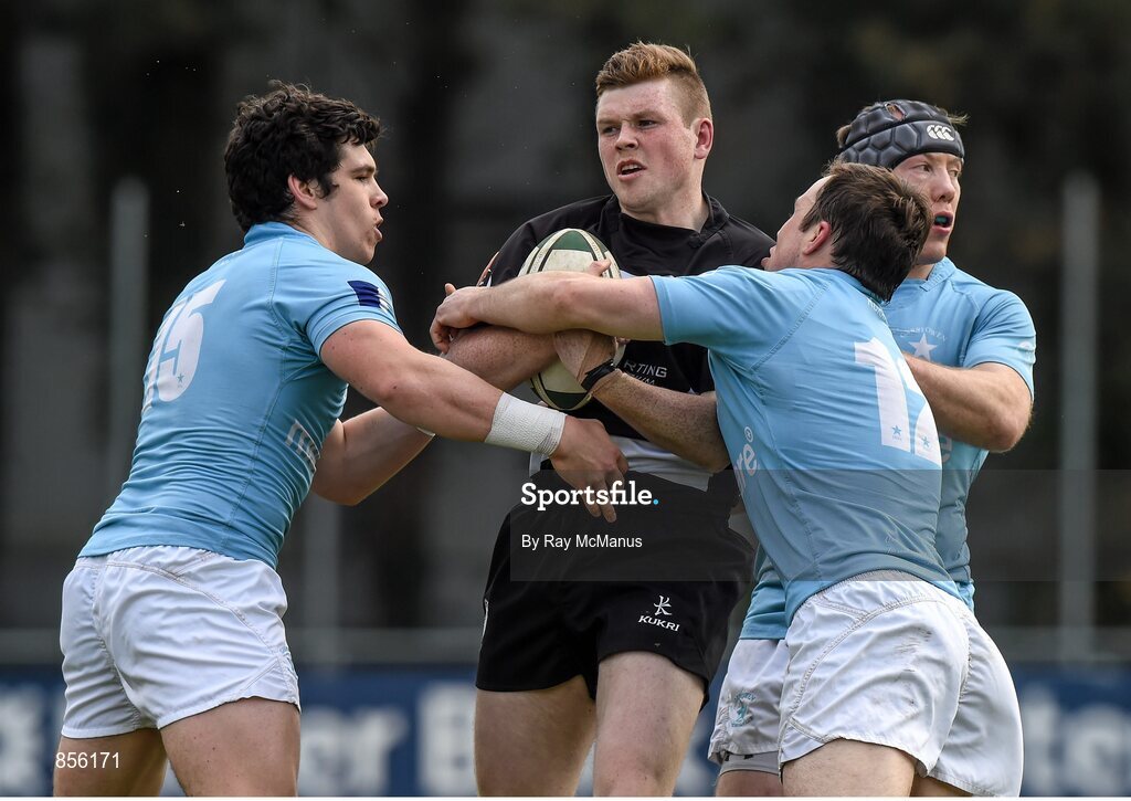 19 April 2014; Josh Glynn, Old Belvedere, is tackled by Alex Wooten, left, and Shaun Berne, Garryowen. Ulster Bank League Division 1A, Garryowen v Old Belvedere, Dooradoyle, Limerick. Picture credit: Ray McManus / SPORTSFILE