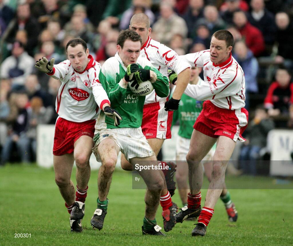 Presspics Sunday 12th February 2005 Fermanaghs James Sherry against Tyrones Brian Meenan, Kevin Hughes and Cormac Mc Ginley ; Fermanagh V Tyrone Allianz National League at Brewester Park Enniskillen, Co Fermanagh .Picture Credit-Oliver Mc Veigh