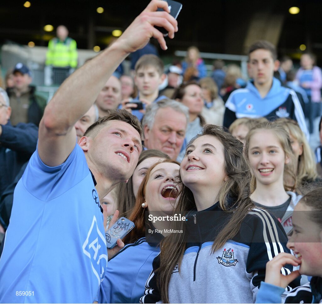 27 April 2014; Dublin's Paul Flynn poses with girls from the Na Fianna GAA Club for a 'selfie' after the game. Allianz Football League Division 1 Final, Dublin v Derry, Croke Park, Dublin. Picture credit: Ray McManus / SPORTSFILE