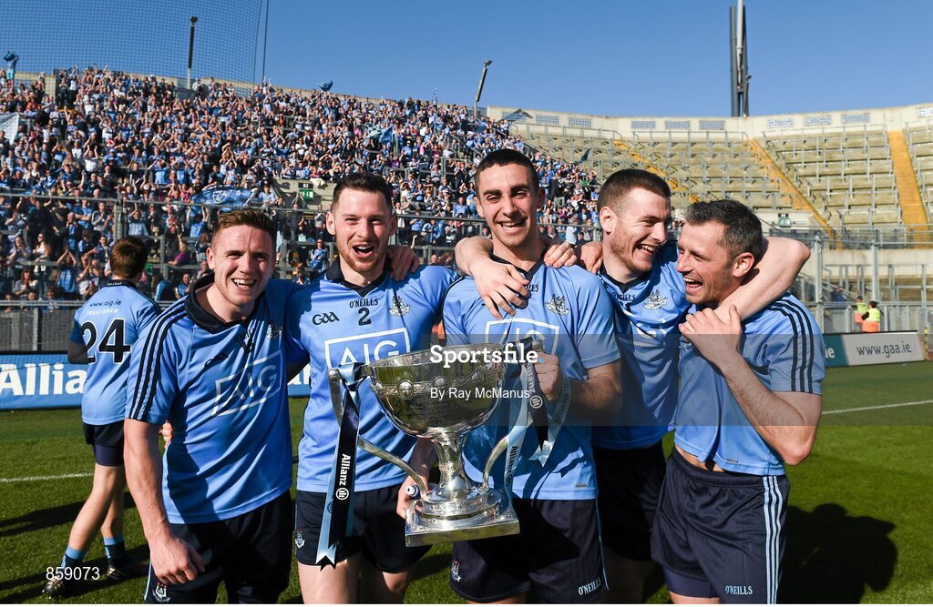 27 April 2014; Dublin right corner forward Alan Brogan jumps in to celebrate with Ballymun Kickhams players Davy Byrne, Philly McMahon, James McCarthy and Sean George after the game. Allianz Football League Division 1 Final, Dublin v Derry, Croke Park, Dublin. Picture credit: Ray McManus / SPORTSFILE