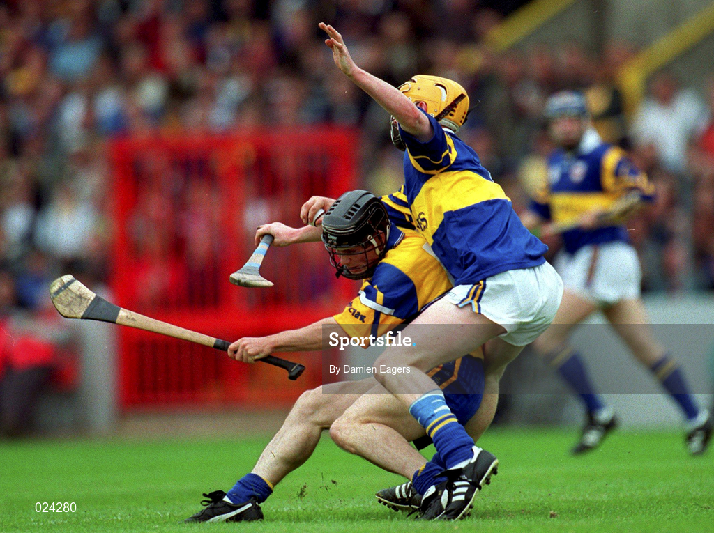 12 June 1999; David Forde of Clare in action against Eamonn Corcoran of Tipperary during the Guinness Munster Senior Hurling Championship semi-final replay match between Clare and Tipperary at Páirc Uí Chaoimh in Cork. Photo by Damien Eagers/Sportsfile