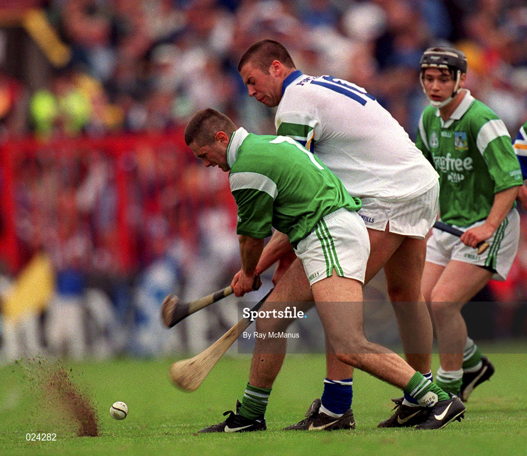 30 May 1999; Clem Smith of Limerick in action against Dan Shanahan of Waterford during the Guinness Munster Senior Hurling Championship quarter-final match between Limerick and Waterford at Páirc Uí Chaoimh in Cork. Photo by Ray McManus/Sportsfile