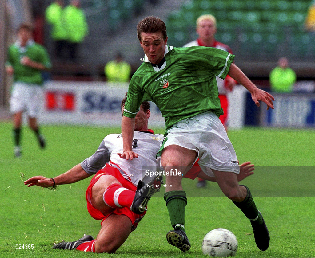 29 May 1999; David Connolly of Republic of Ireland in action against Mark Williams of Northern Ireland during the international friendly match between Republic of Ireland and Northern Ireland at Lansdowne Road in Dublin. Photo by Ray Lohan/Sportsfile