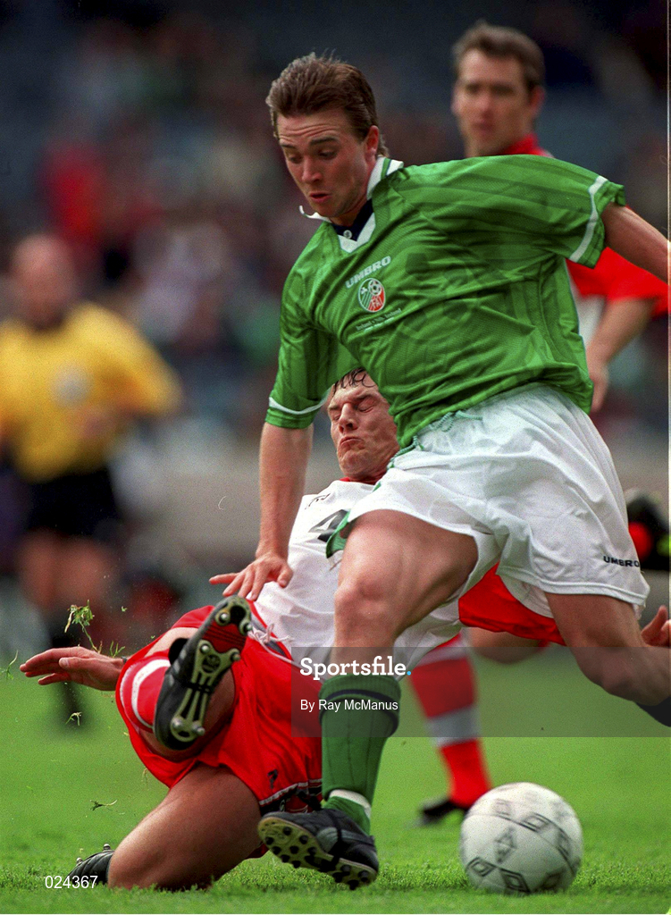 29 May 1999; David Connolly of Republic of Ireland is tackled by Mark Williams of Northern Ireland during the international friendly match between Republic of Ireland and Northern Ireland at Lansdowne Road in Dublin. Photo by Ray McManus/Sportsfile
