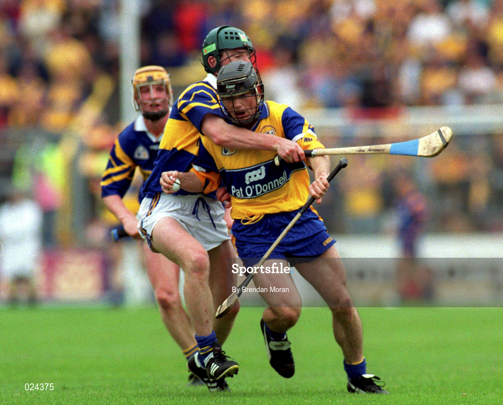 12 June 1999; David Forde of Clare in action against David Kennedy of Tipperary during the Guinness Munster Senior Hurling Championship semi-final replay match between Clare and Tipperary at Páirc Uí Chaoimh in Cork. Photo by Brendan Moran/Sportsfile