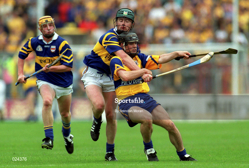 12 June 1999; David Forde of Clare in action against David Kennedy of Tipperary during the Guinness Munster Senior Hurling Championship semi-final replay match between Clare and Tipperary at Páirc Uí Chaoimh in Cork. Photo by Brendan Moran/Sportsfile